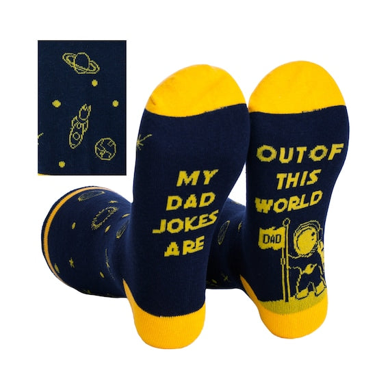 Midnight blue Funny Socks for Dad Space Themed Pattens in yellow with words  My Dad Jokes out of this world on the bottom of the socks on white background